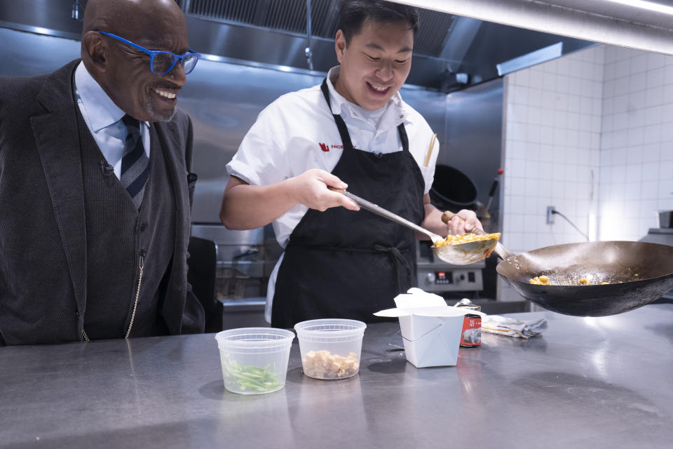 Chef Lucas Sin of Nice Day Chinese teaches Al Roker how to make his signature dish mapo macaroni and cheese. (Tiara Chiaramonte / NBC News)