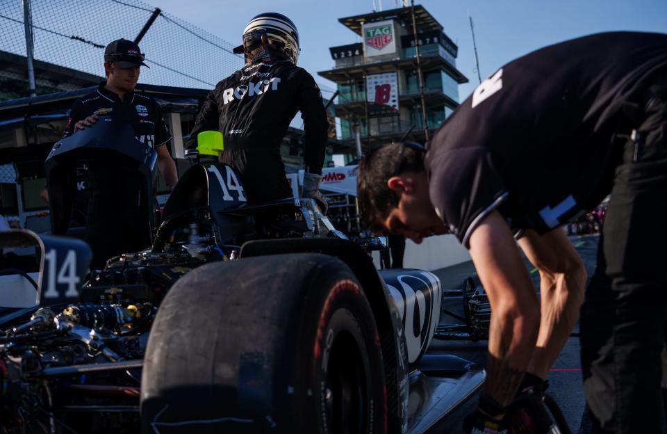 A. J. Foyt Enterprises driver Kyle Kirkwood (14) sits down into his car Tuesday, May 17, 2022, ahead of the first practice session in preparation for the 106th running of the Indianapolis 500 at Indianapolis Motor Speedway.