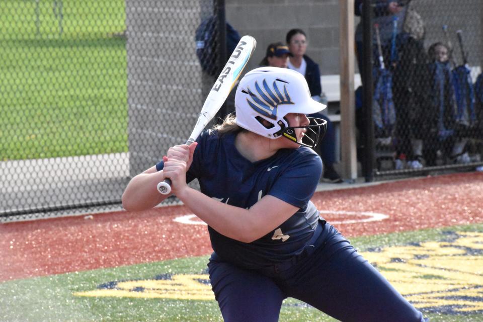 Decatur Central's Laci Boggs prepares to take a swing at a ball during the Hawks' rivalry matchup with Mooresville on April 12, 2022.