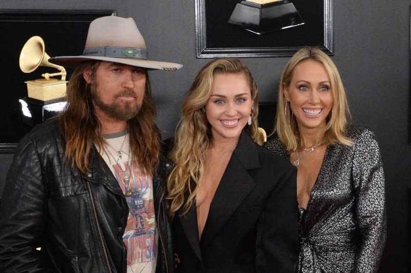 Billy Ray Cyrus, Miley Cyrus and Tish Cyrus, from left to right, attend the Grammy Awards in 2019. File Photo by Jim Ruymen/UPI