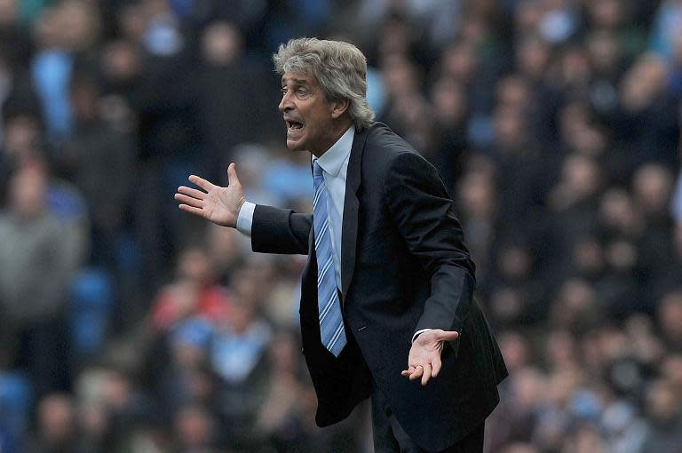 Manchester City manager Manuel Pellegrini (pictured) has taken a swipe at old rival Jose Mourinho by claiming he wouldn't want to win the Premier League in the manner of champions-elect Chelsea