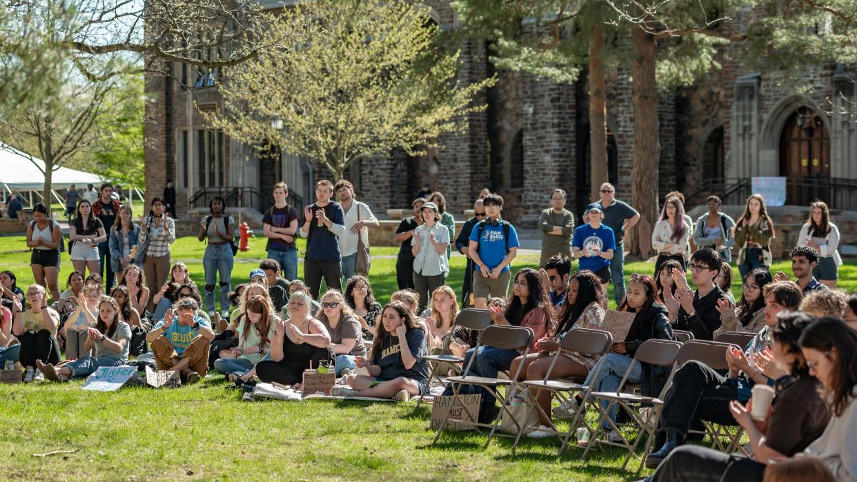 Students and faculty listen to a speaker during Hamilton College's Students for Justice in Palestine gathering at Hamilton College in Clinton, NY on Thursday, May 2, 2024.