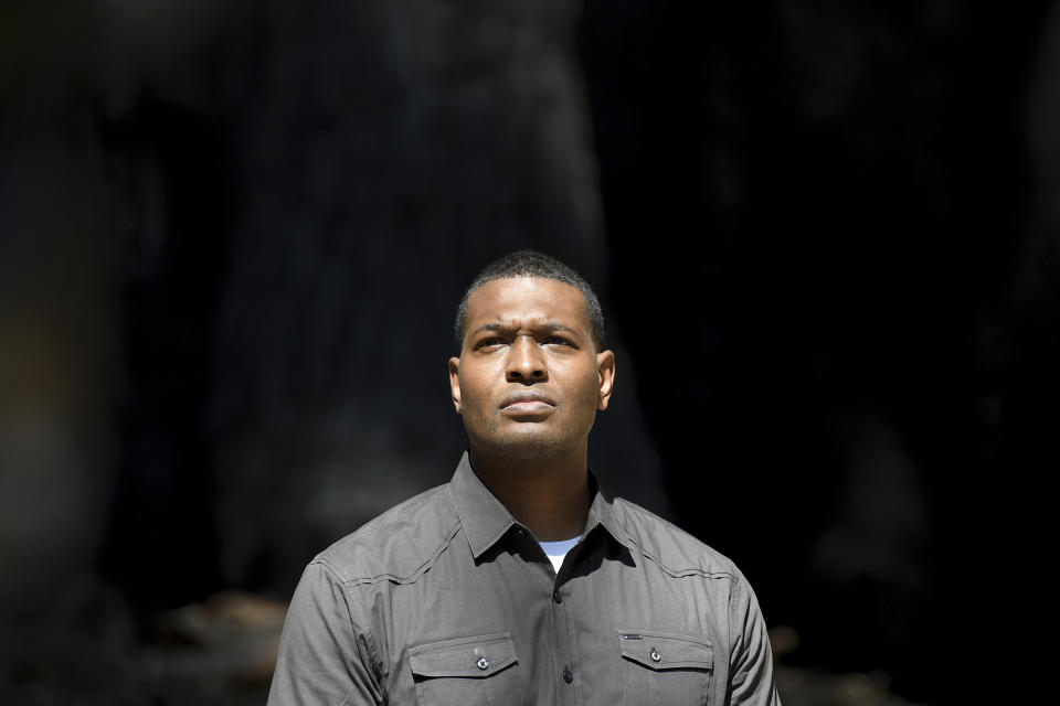 U.S. EPA Administrator Michael Regan walks through Big Basin Redwoods State Park near Boulder Creek, Calif., Tuesday, Aug. 17, 2021. (AP Photo/Nic Coury)