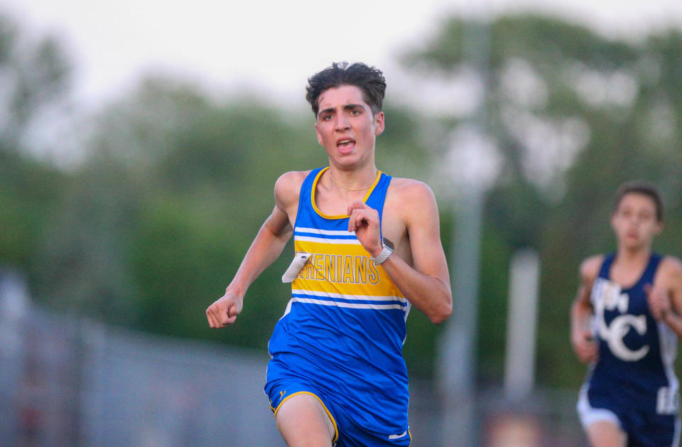 Ryan Miller (10), Crawfordsville High School, sprints the last 100 meters of the 3200 Meter Run at the 2022 IHSAA Boys Track and Field Sectional at West Lafayette Athletic Complex, on May 19, 2022, in West Lafayette.