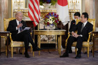 U.S. President Joe Biden, left, talks to Japanese Prime Minister Fumio Kishida during a bilateral meeting at Akasaka Palace, Monday, May 23, 2022, in Tokyo. (AP Photo/Evan Vucci)