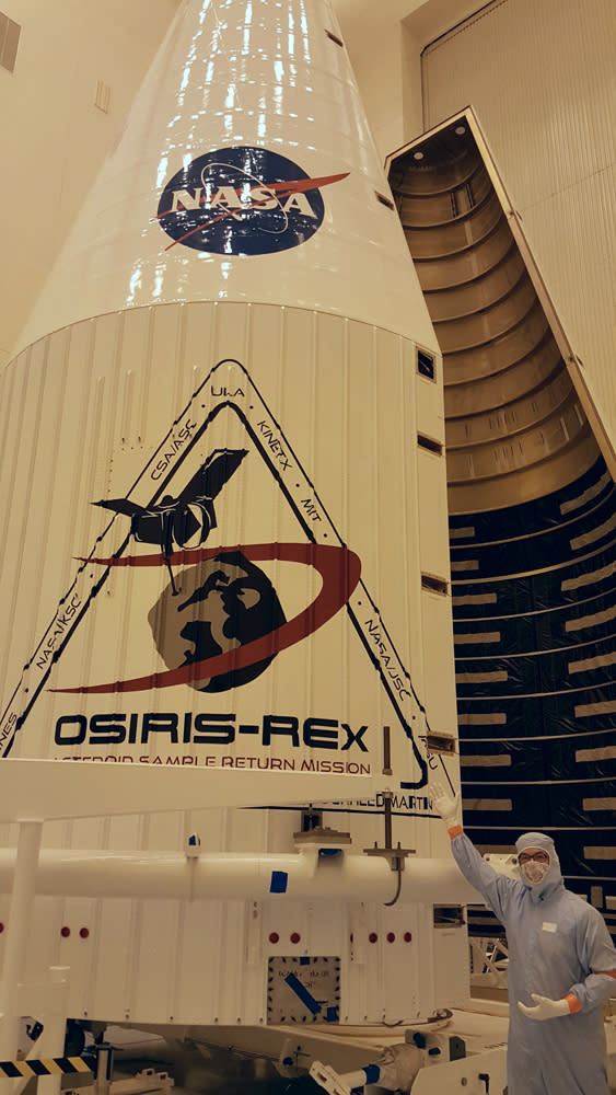 OSIRIS-REx principal investigator Dante Lauretta poses in front of the payload fairing. He has been working on this project since 2004 and said he is excited for the launch.