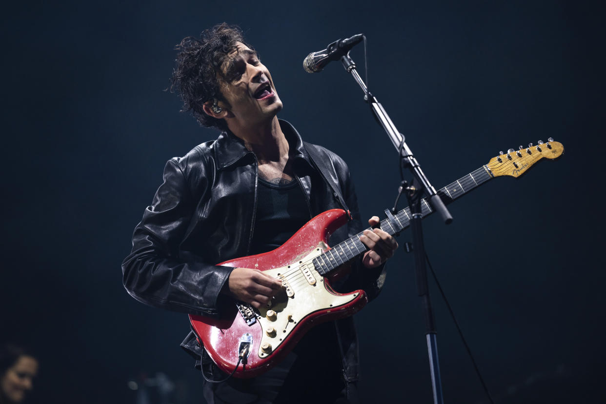 Matthew Healy of The 1975 performs at the Reading Music Festival, England, Saturday, Aug. 26, 2023. (Photo by Scott Garfitt/Invision/AP)