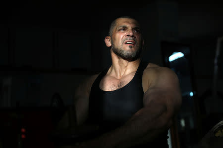 Ibrahim al-Masri, trains at a gym, on his last day as the chief muezzin of the Al-Jazzar Mosque, in Acre, northern Israel January 31, 2019. REUTERS/Ammar Awad