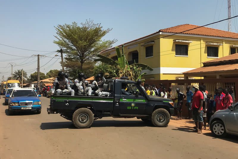 Guinea-Bissau soldiers are pictured in the streets of the capital city of Bissau