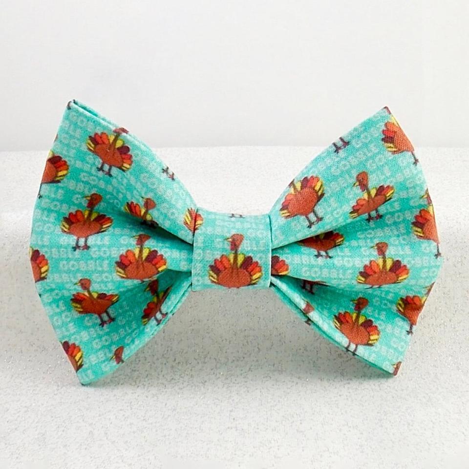 Product photo of a Thanksgiving Dog Bow Tie on a gray background