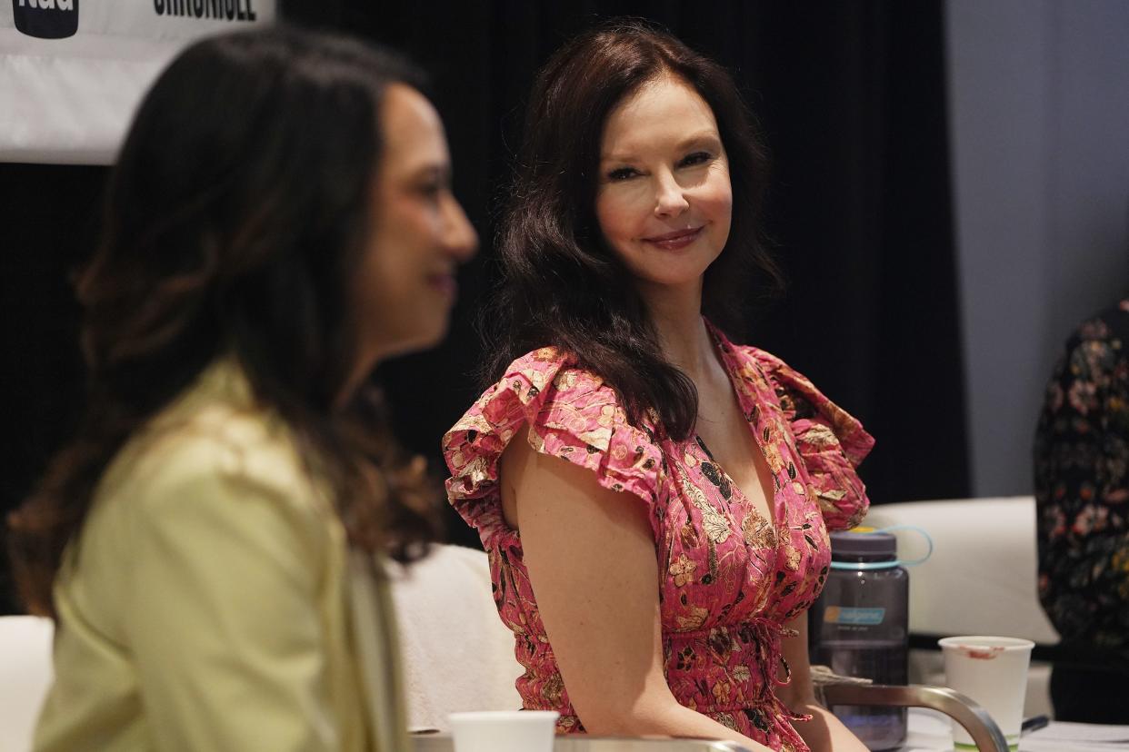 Actress, social justice advocate and suicide loss survivor Ashley Judd listens to Dr. Christine Yu Moutier, chief medical officer of the American Foundation for Suicide Prevention, speak during a South by Southwest session on "Preventing Suicide Through Safe Reporting and Storytelling."