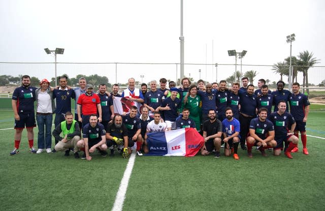 England and French supporters before their seven-a-side game in Doha (Peter Byrne/PA) 