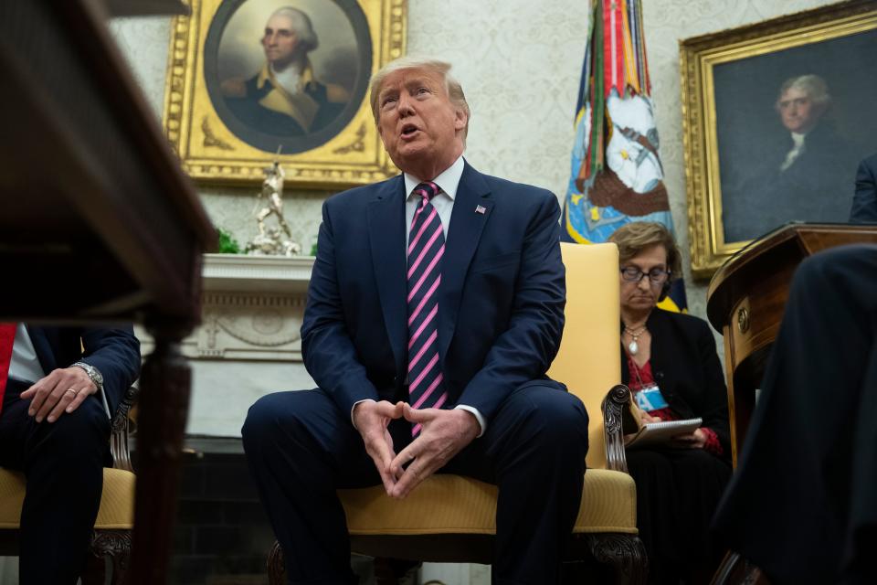President Donald Trump speaks during a meeting in the Oval Office on Dec. 13, 2019.