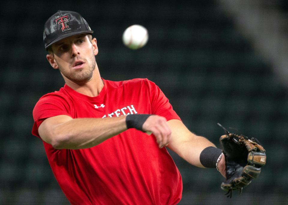 Texas Tech's Parker Kelly (15) warms-up before the game against Oklahoma in the second-round Big 12 tournament game, Thursday, May 26, 2022, at Globe Life Field in Arlington. 