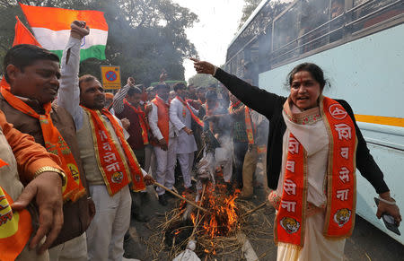 Supporters of Shiv Sena, a Hindu hardline group, shout slogans during a protest against the attack on a bus that killed 44 Central Reserve Police Force (CRPF) personnel in south Kashmir on Thursday, in New Delhi, India February 16, 2019. REUTERS/Anushree Fadnavis