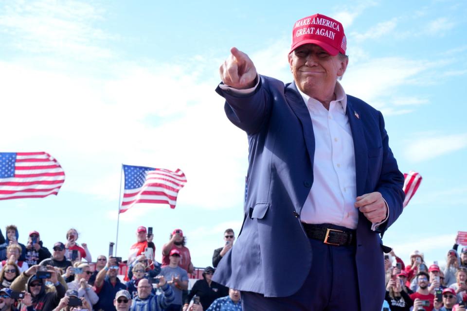 Donald Trump speaking at a rally in Ohio on 16 March (AP)