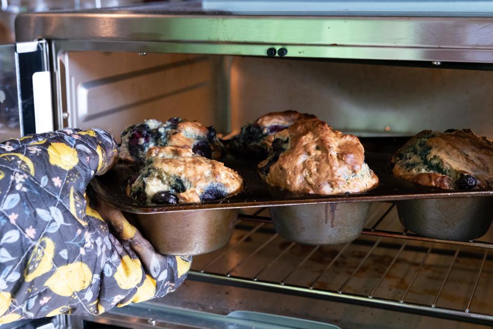 Gazelle Allen, baker at Way Cup Café, makes fresh blueberry muffins from scratch on Tuesday, April 16.