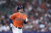 Houston Astros' Jose Altuve runs out a ground out against the Oakland Athletics during the first inning of a baseball game Friday, May 19, 2023, in Houston. (AP Photo/David J. Phillip)