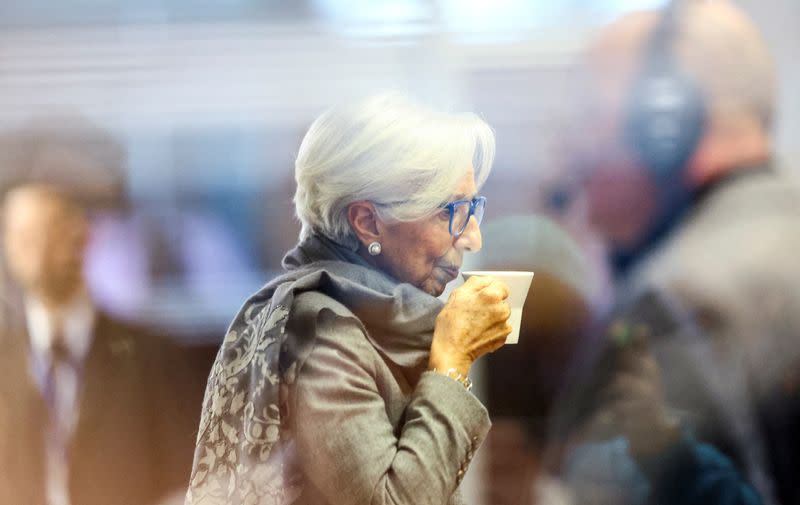 FILE PHOTO: European Central Bank (ECB) President Christine Lagarde drinks from a cup ahead of speaking to the media following a monetary policy meeting in Frankfurt