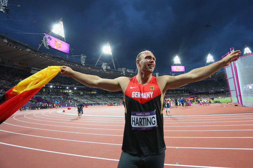 Harting was trying to celebrate his golden throw. (Photo by Alexander Hassenstein/Getty Images)