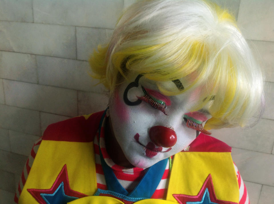 Whiteface clown Jessycorazon, 36, poses for a photo during Mexico's 17th annual clown convention, La Feria de la Risa, in Mexico City, Wednesday, Oct. 24, 2012. Approximately 500 clowns gathered at two local theaters in the capital city to exchange ideas, compete for laughs and show off their comedy performances. Jessycorazon has been as a clown for 19 years. (AP Photo/Anita Baca)