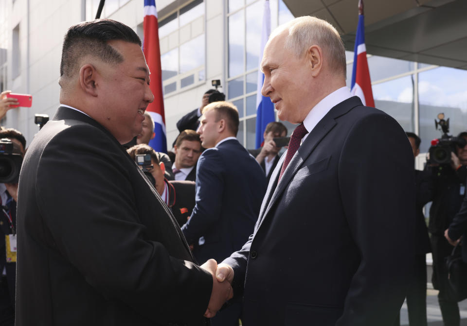 Russian President Vladimir Putin, right, and North Korea's leader Kim Jong Un shake hands during their meeting at the Vostochny cosmodrome outside the city of Tsiolkovsky, about 200 kilometers (125 miles) from the city of Blagoveshchensk in the far eastern Amur region, Russia, on Wednesday, Sept. 13, 2023. (Mikhail Metzel, Sputnik, Kremlin Pool Photo via AP)