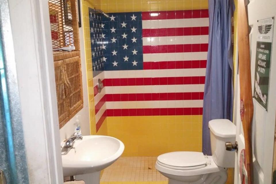 Today, the patriotic, masculine rental property in Geneva, Fla. draws travelers from around the world. Photo credit: Airbnb.