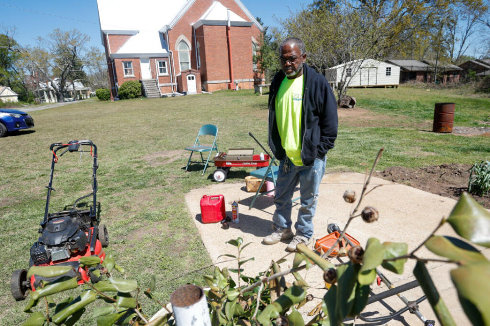 A man standing in a garden