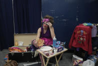 <p>Beth Walters, takes a break in Clown Alley between acts during a show with the Ringling Bros. Barnum and Bailey Circus red unit, Friday, May 5, 2017, in Providence, R.I. “The Greatest Show on Earth” is about to put on its last show on earth. For the performers who travel with the Ringling Bros. and Barnum & Bailey Circus, its demise means the end of a unique way of life for hundreds of performers and crew members. (Photo: Julie Jacobson/AP) </p>