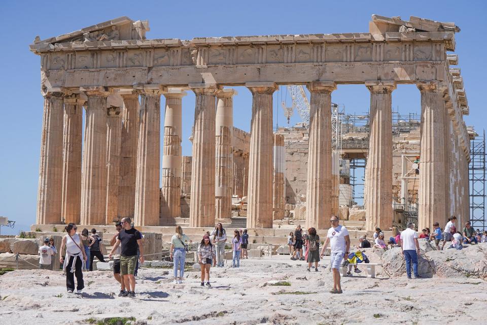 Tourists visit the acropolis in Athens