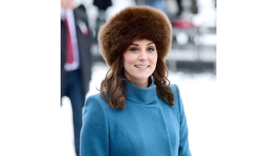 Kate Middleton wearing a brown fluffy hat 