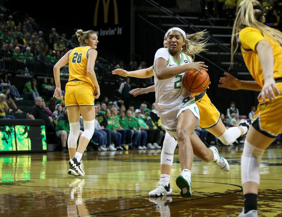 Oregon guard Chance Gray drives toward the basket as the Oregon Ducks take on North Dakota State in their WNIT opener on Mach 15 at Matthew Knight Arena in Eugene.