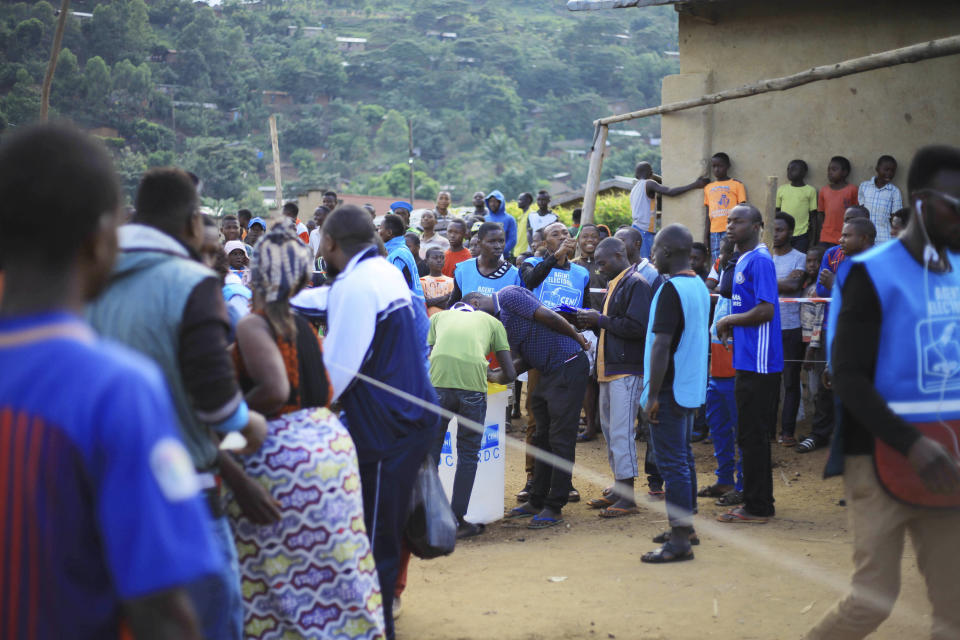 Congolese participate in a mock voting in the Eastern Congolese town of Beni Sunday Dec. 30, 2018. The delay of Sunday's election until March for Beni and Butembo city is blamed on a deadly Ebola outbreak, but the rest of the country will vote today. (AP Photo/Al-hadji Kudra Maliro)
