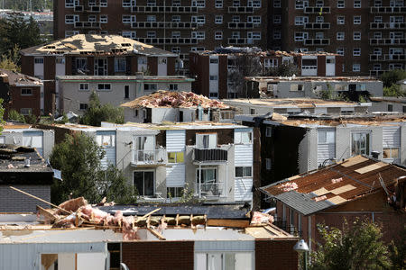 Damaged buildings are seen after a tornado hit the Mont-Bleu neighbourhood in Gatineau, Quebec, Canada, September 22, 2018. REUTERS/Chris Wattie