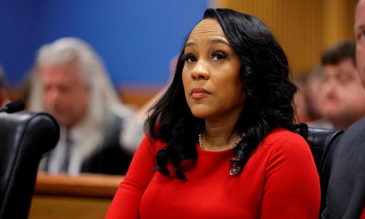 <span>Fulton county district attorney Fani Willis attends a hearing on the Georgia election interference case, March 1, 2024, in Atlanta.</span><span>Photograph: Alex Slitz/Reuters</span>