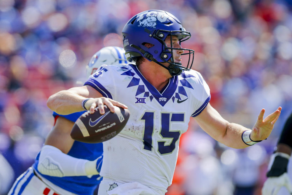 TCU quarterback Max Duggan (15) looks to pass during the first half of an NCAA college game against SMU on Saturday, Sept. 24, 2022, in Dallas, Texas. (AP Photo/Gareth Patterson)