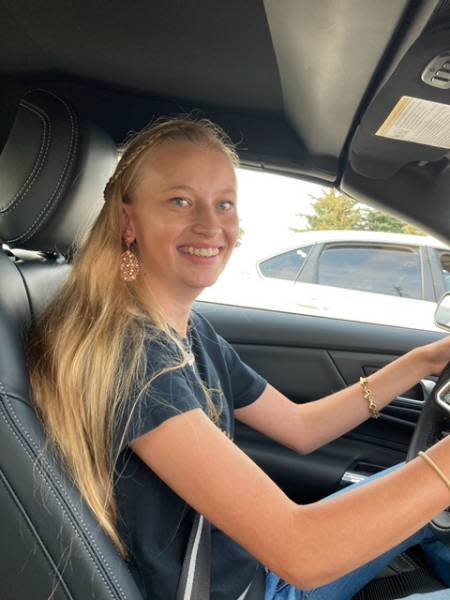 Kelly Ward of Portland, Michigan drives her 2024 Ford Mustang after buying it in August 2023. Studying to be a mechanic, she plans to take over the family's auto repair shop.