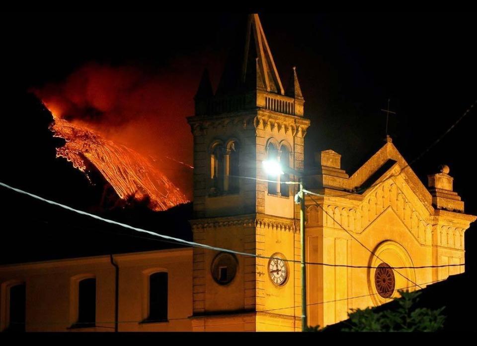 Lava spewed from a crater of the giant Etna volcano in the southern Italy island of Sicily on July 30, 2011 in Catania. The lava flown into a valley overnight and did not represent a danger to inhabited areas. Etna is the highest active volcano in Europe at 3,295 metres (10,810 feet) which last eruption was in May.