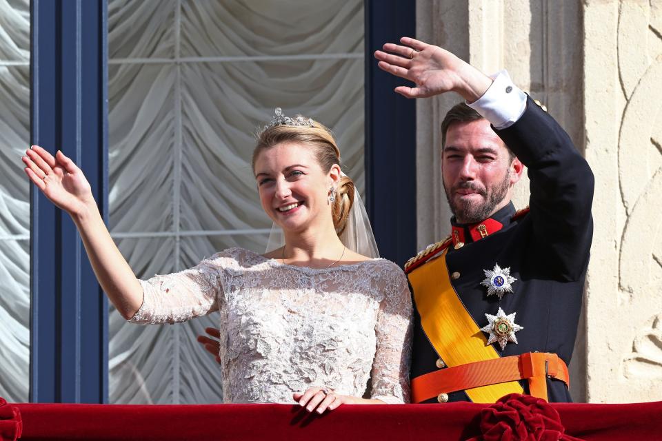 LUXEMBOURG - OCTOBER 20: Princess Stephanie of Luxembourg and Prince Guillaume of Luxembourg wave to the crowds from the balcony of the Grand-Ducal Palace following the wedding ceremony of Prince Guillaume Of Luxembourg and Princess Stephanie of Luxembourg at the Cathedral of our Lady of Luxembourg on October 20, 2012 in Luxembourg, Luxembourg. The 30-year-old hereditary Grand Duke of Luxembourg is the last hereditary Prince in Europe to get married, marrying his 28-year old Belgian Countess bride in a lavish 2-day ceremony. (Photo by Andreas Rentz/Getty Images)