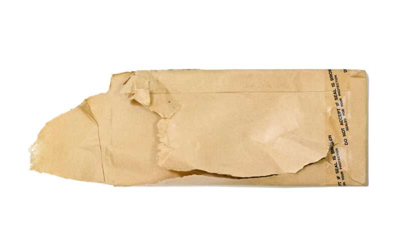 torn brown envelope