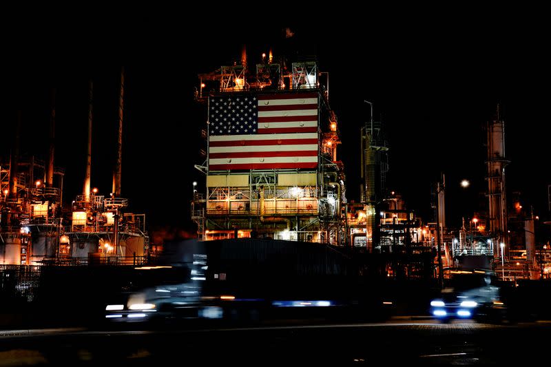 FILE PHOTO: Giant U.S. flag outside Marathon's Los Angeles Refinery in Carson, California