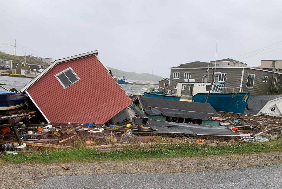 This photo provided by Pauline Billard shows destruction caused by Hurricane Fiona in Rose Blanche, 45 kilometers (28 miles) east of Port aux Basques, Newfoundland and Labrador, Saturday, Sept. 24, 2022. (Pauline Billard via AP)