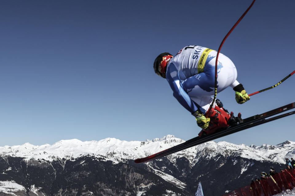 United States' Travis Ganong speeds down the course during the alpine ski, men's World Championship downhill, in Courchevel, France, Sunday, Feb. 12, 2023. (AP Photo/Gabriele Facciotti)