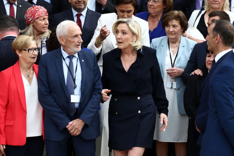 Newly-elected lawmakers make entry to the National Assembly in Paris