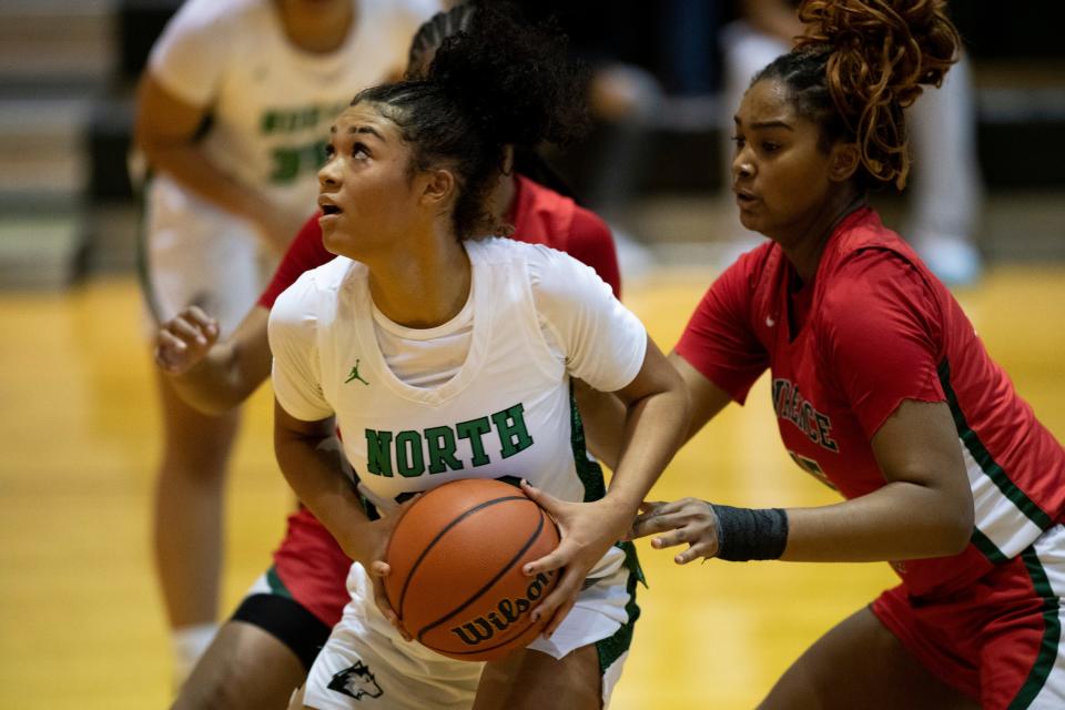North’s Amiyah Buchanan (23) eyes the net as the North Huskies play the Lawrence North Cats during the 2022 Evansville North Basketball Showcase at North High School in Evansville, Ind., Saturday, Dec. 3, 2022. 