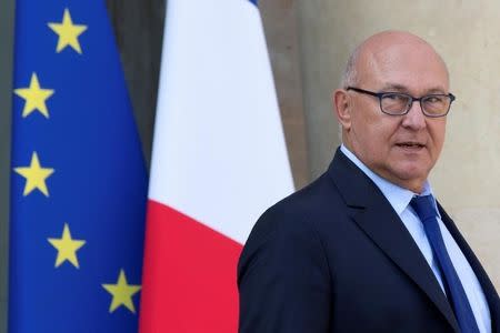 French Finance Minister Michel Sapin leaves the Elysee Palace following the weekly cabinet meeting in Paris, France September 10, 2014. REUTERS/Philippe Wojazer/File Photo