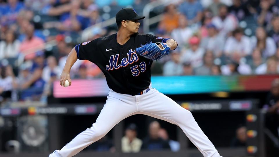 Jun 30, 2023; New York City, New York, USA; New York Mets starting pitcher Carlos Carrasco (59) pitches against the San Francisco Giants during the first inning at Citi Field. Mandatory Credit: Brad Penner-USA TODAY Sports