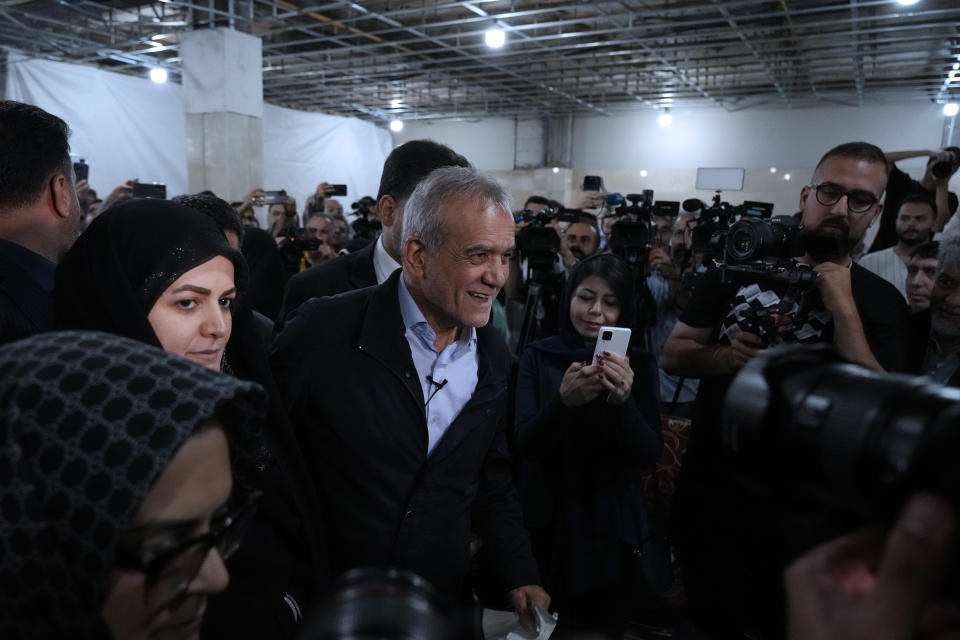 Reformist candidate for Iran's June 28, presidential election Masoud Pezeshkian arrives for a campaign rally in Tehran, Iran, Friday, June 14, 2024. (AP Photo/Vahid Salemi)