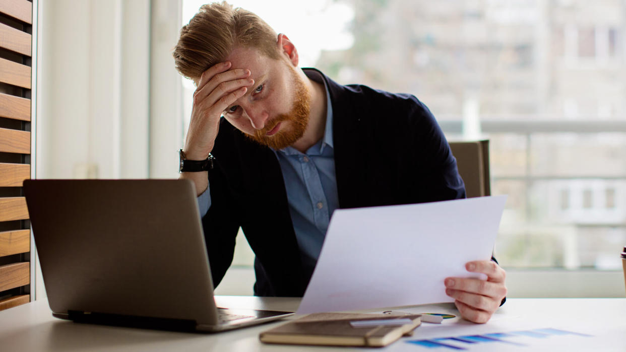 Young businessman under stress.