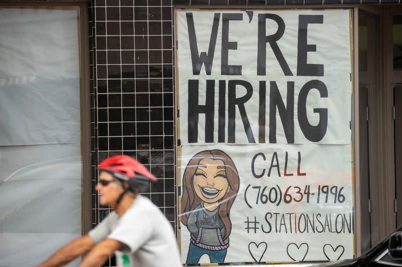 A new business advertises for workers as it prepares to open up during the outbreak of the coronavirus disease in California,